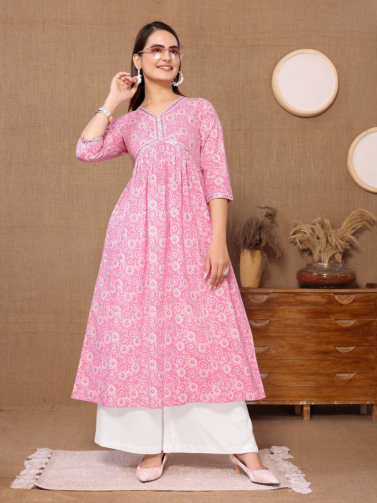     			Rangita Women Cotton Pink Embroidered Calf Length Flared Kurti